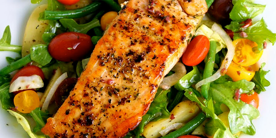 Salmon Steaks fried in Butter with salad